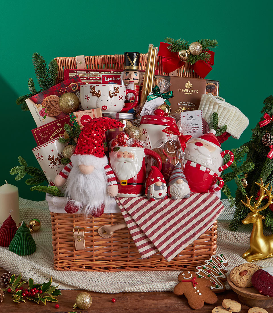 Santa mug Christmas gift basket with butter cookies and gingerbread.
