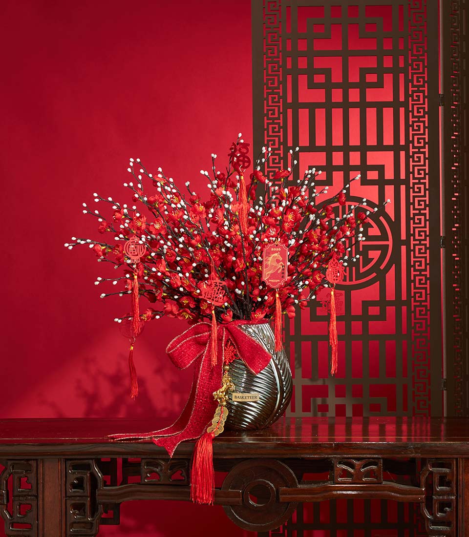 Chinese New Year red cherry artificial flower vase arrangement for festive decor|Close-up of Chinese New Year red cherry artificial flower branches|Chinese New Year red cherry artificial flower arrangement with festive ornaments|Detail of red cherry artificial blossoms styled for Chinese New Year|Chinese New Year lucky tag detail on red cherry artificial flower arrangement|Chinese New Year red cherry artificial flower vase with ribbon and lucky charm