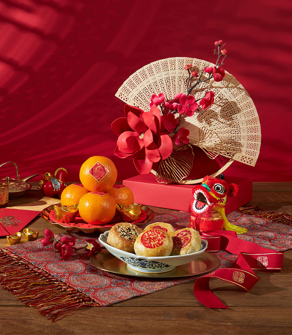 Chinese New Year auspicious orange and pastry assortment in premium presentation