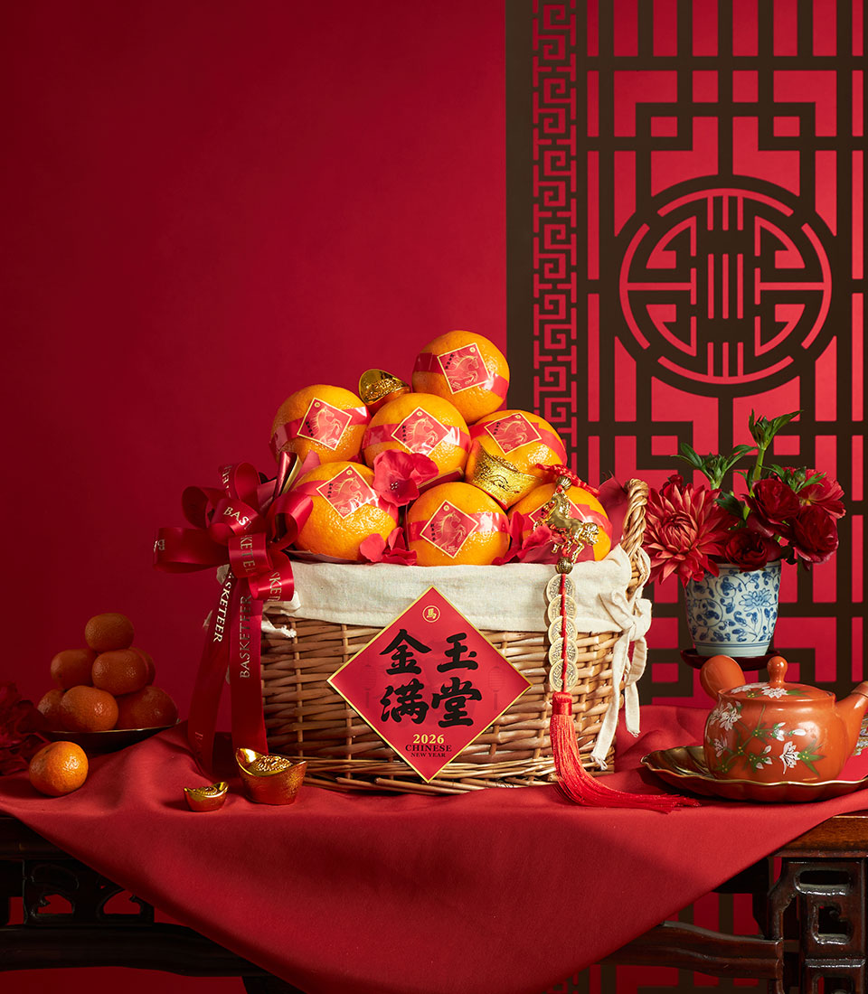 Prosperity Chinese New Year oranges gift basket with red and gold accents