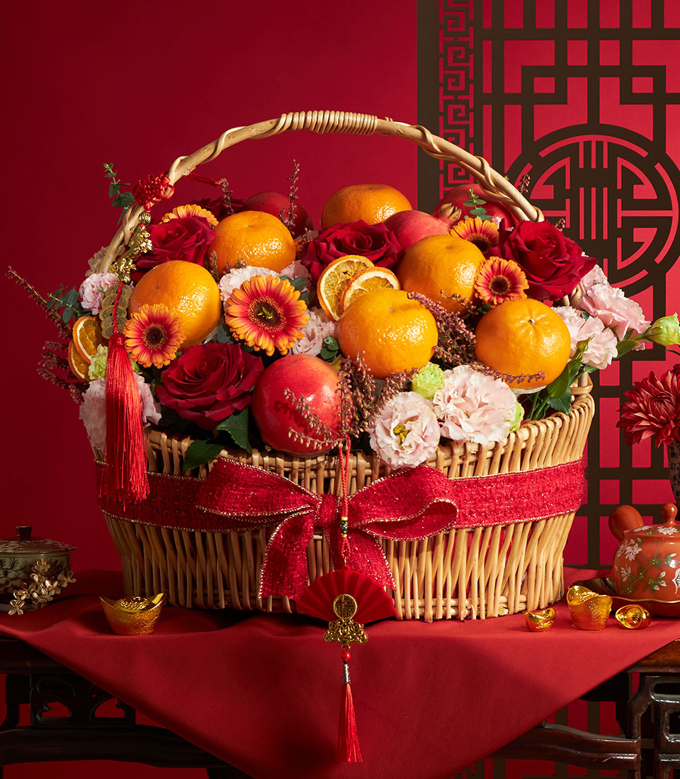 Chinese New Year oranges and floral gift basket with red flowers for Bangkok delivery
