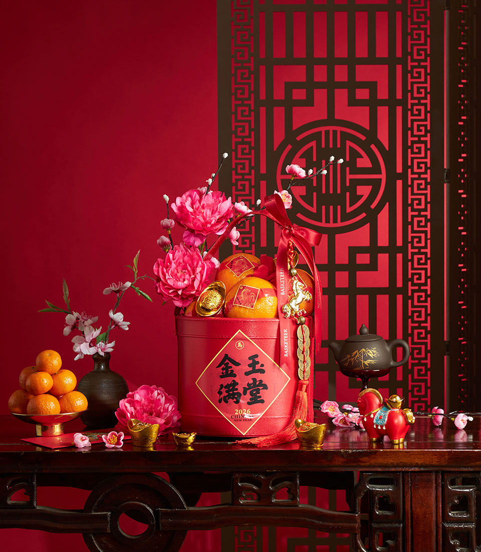 Prosperity Chinese New Year oranges gift basket with festive floral decoration