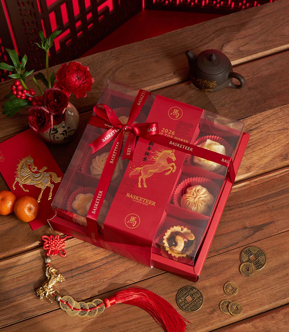 Classic Chinese New Year bakery gift box with assorted traditional pastries in red festive packaging