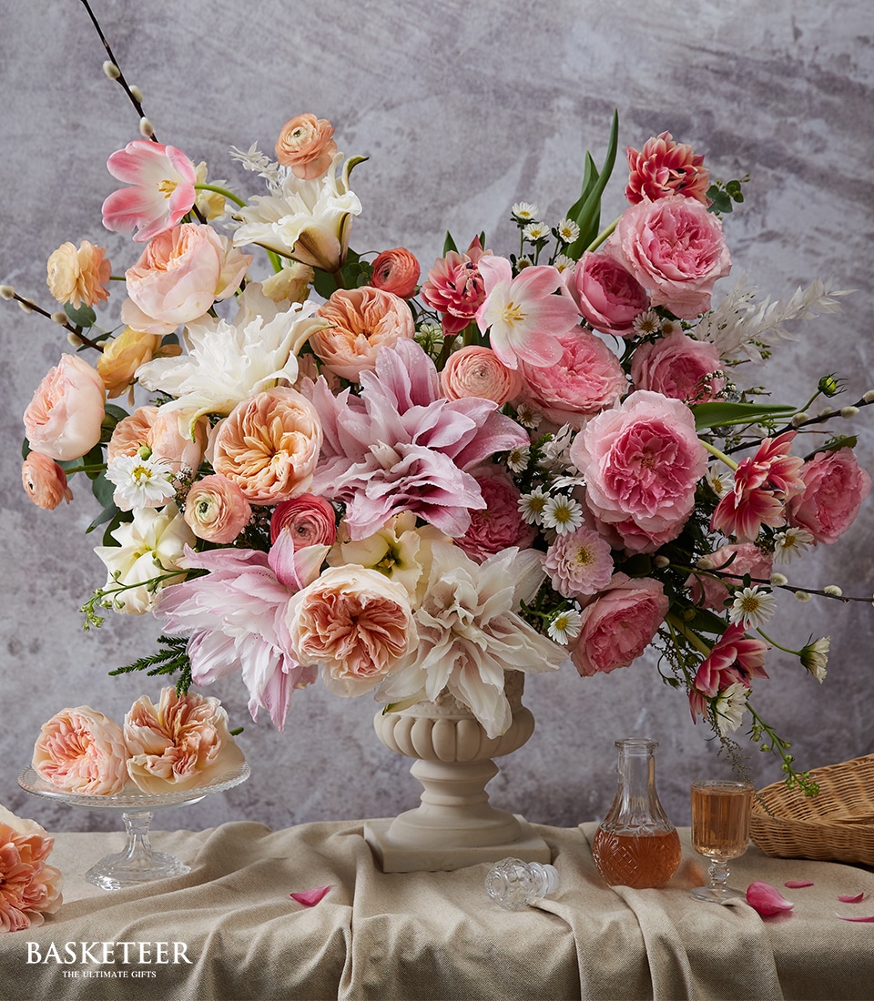 Pastel mixed flower bouquet with roses and seasonal blooms in elegant soft tones Bangkok delivery