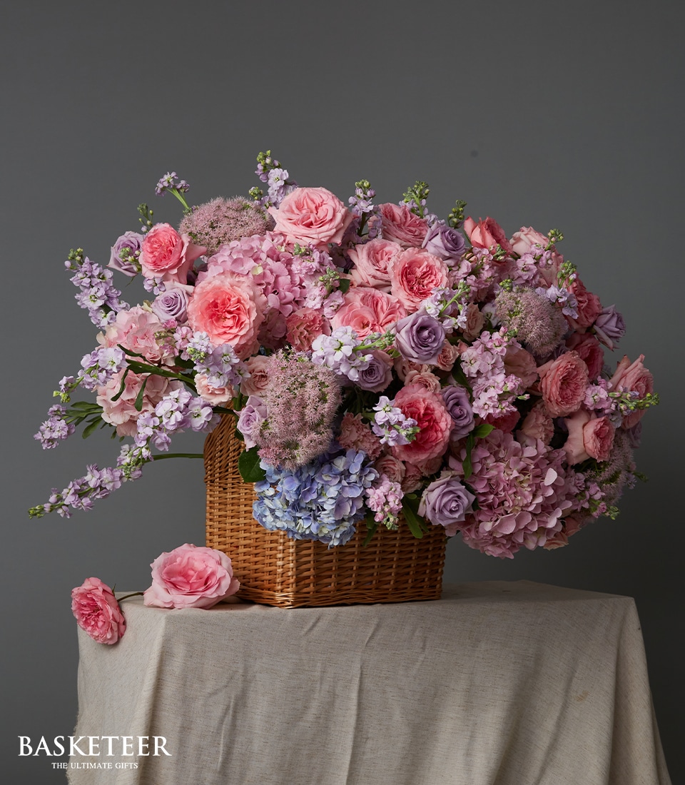 Pastel mixed bouquet with pink roses lilac flowers and soft seasonal blooms Bangkok delivery