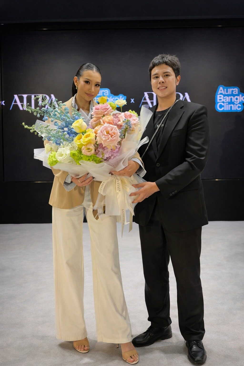 Flowers by Basketeer colorful bouquet with mixed blooms presented at an event for elegant floral gifting in Bangkok.
