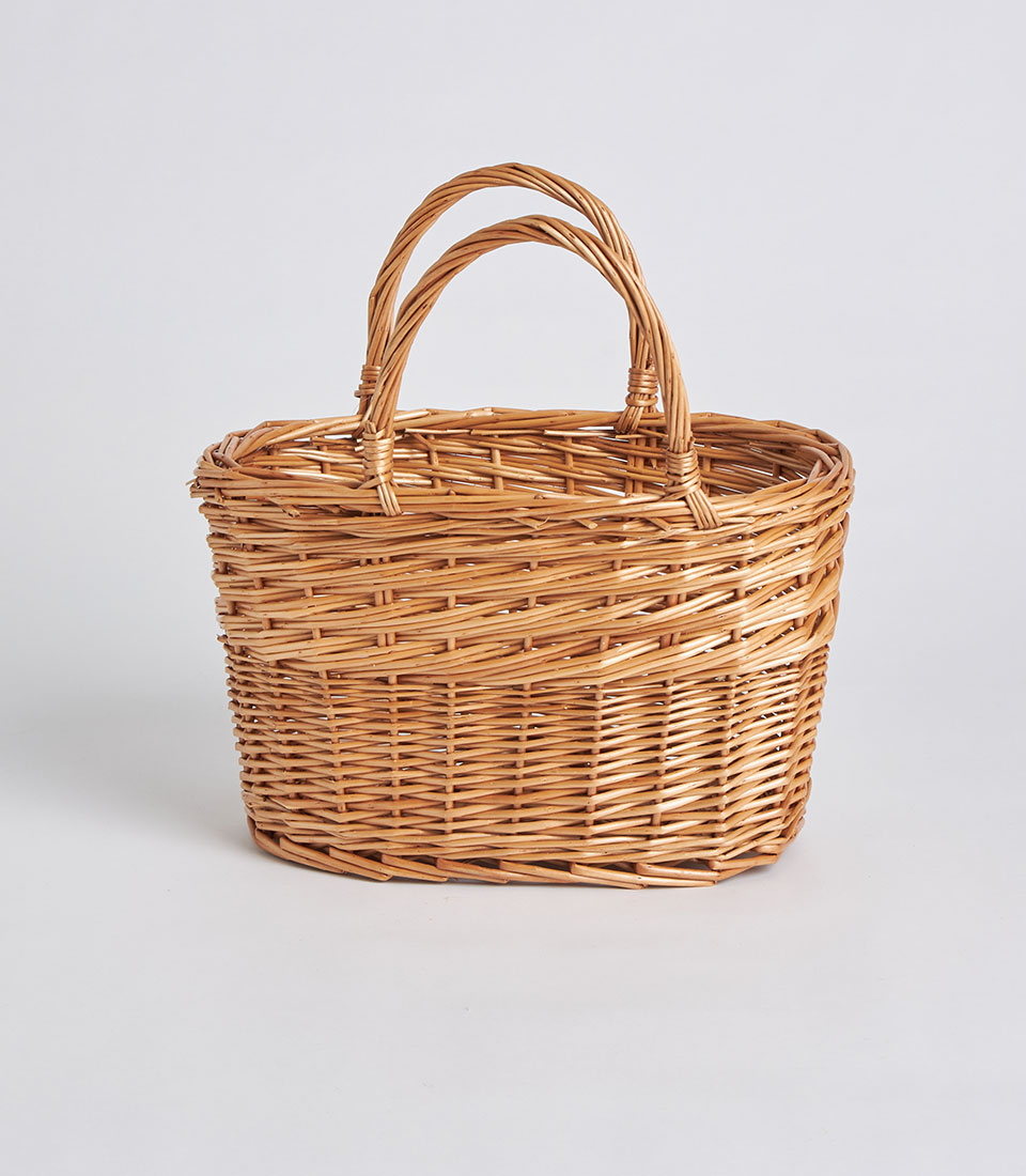 Front view of handcrafted oval wicker basket with double handles SKU BK-529