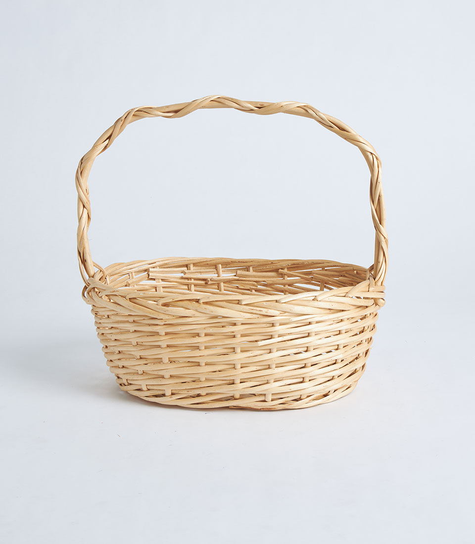Front view of a natural oval wicker basket SKU BK-081