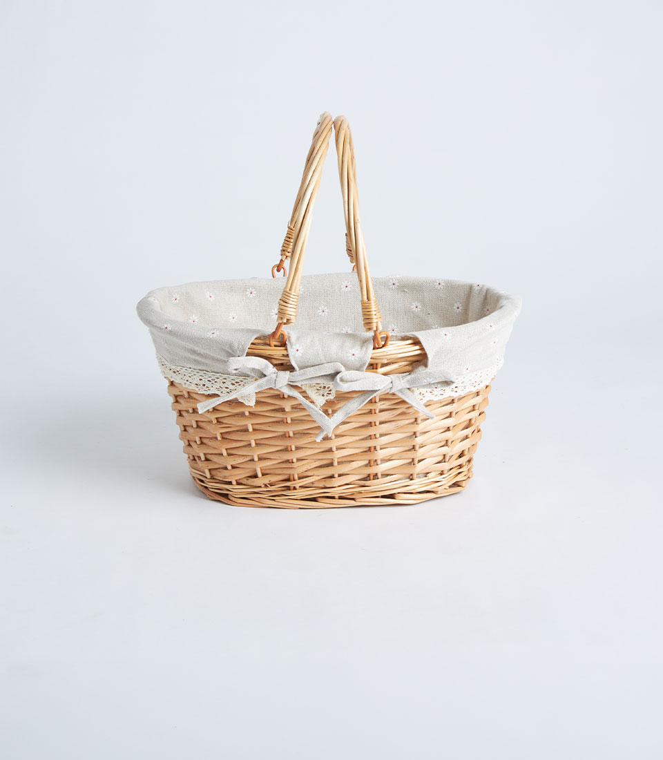 Oval light beige wicker basket with pattern lining and ribbon BK-539