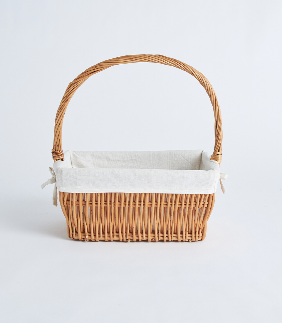 Front view of light brown wicker basket with handle and beige lining BK-013
