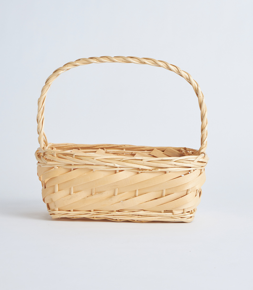 Front view of oval light natural wicker basket with handle BK-080