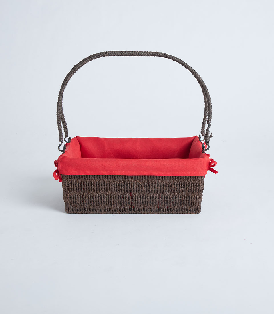 Front view of dark wicker basket with handle and red fabric liner BK-467