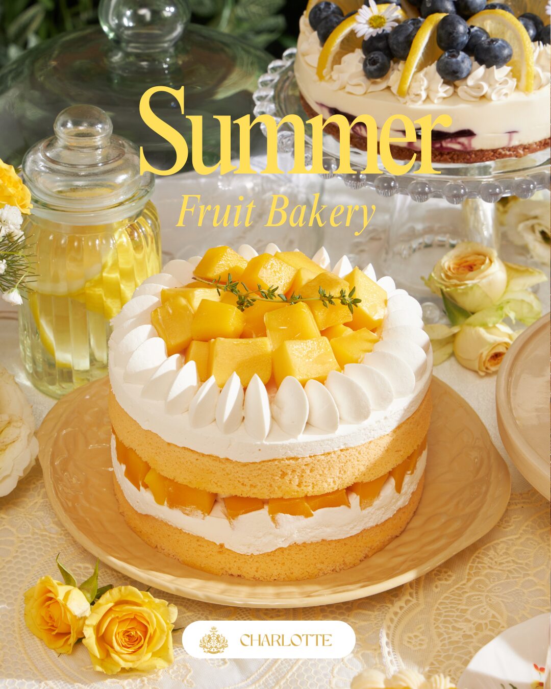 summer mango chiffon cake with fresh cream and fruit topping by Charlotte Bakery Bangkok